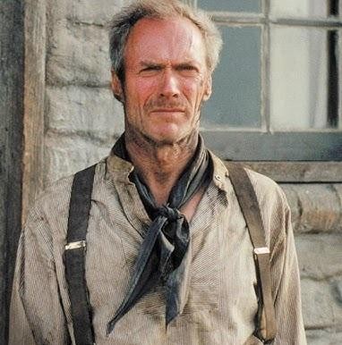 Clint Eastwood jako Brudny Harry z rewolwerem .44 Magnum w dynamicznej pozie na tle miejskiej ulicy.